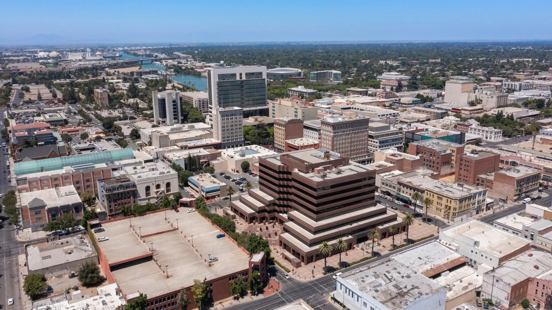 Aerial photograph of downtown Stockton, California showing office towers, the channel and surrounding city blocks